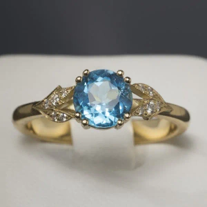 Pierścionek zaręczynowy z żółtego złota z topazem i brylantami ID 441